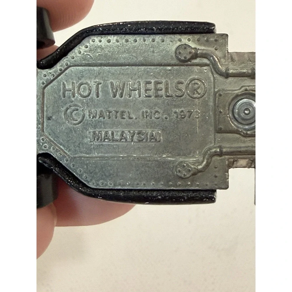 1982 Hot Wheels Malibu Grand Prix 1973 Malaysia Blackwalls Metal Base Black #1